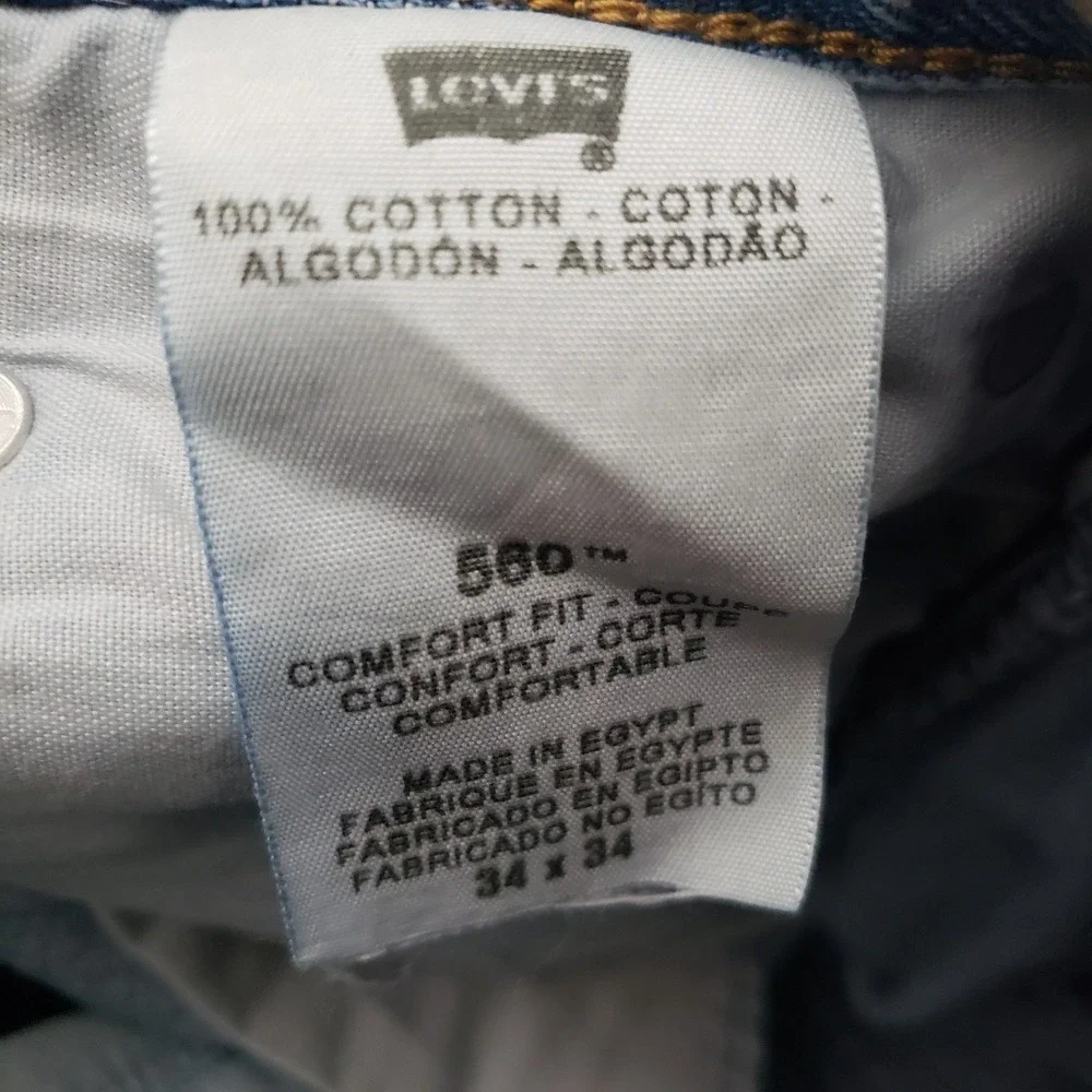 VTG Levi's 560 Jeans Mens 34x34 Blue Y2K Comfort Fit Denim Light Wash Distressed